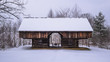 A historic barn in the snow at Smoky Mtn Nat'l Park's Cades Cove