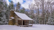 A historic cabin in the snow at Smoky Mtn Nat'l Park's Cades Cove