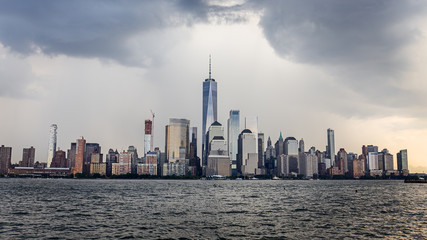 Wall Mural - Lower Manhattan Skyline on a cloudy day, NYC, USA