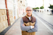 © F8  \ Suport Ukraine - Portrait of Caucasian mature man smiling at camera with crossed hands