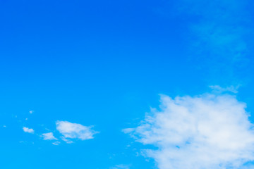 Poster - Blue sky background with tiny clouds. White fluffy clouds in the blue sky