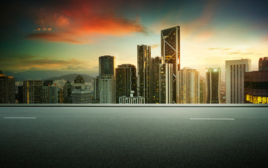 Wall Mural - side view asphalt road on snight scene near the modern city .
