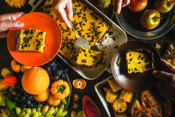 Turkey, chocolate pumpkin pie, vegetables and fruits in a festive feast