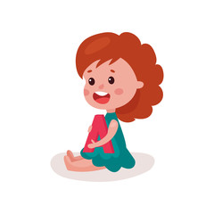 Wall Mural - Adorable redhead little girl sitting on the floor playing with letter A, kid learning through fun and play colorful cartoon vector Illustration