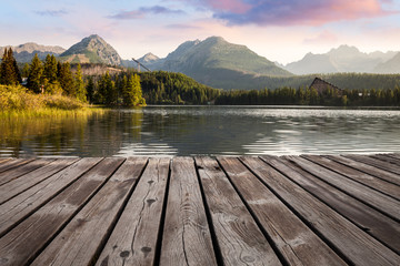 Alpine mountain lake sunny morning view