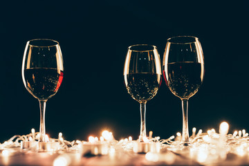 Wall Mural - Glasses of wine and fairylights