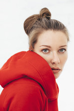 Portrait Of A Woman Wearing Red Hoodie