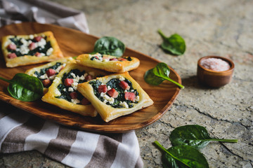 Wall Mural - Savoury spinach cakes with bacon and Feta cheese