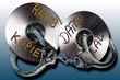 Handuffs and CD/DVD: symbolic for data theft crime