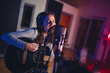 © Jacob Lund - Female vocal artist singing in a recording studio
