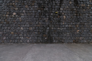 Dark gray stone wall