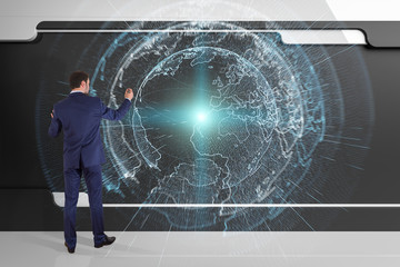 Poster - Businessman using digital planet earth interface on a board 3D rendering