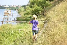 Cute Boy Going Fishing On Summer Day