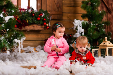 Wall Mural - Christmas Happy funny children twins sisters, Happy girls for the new year