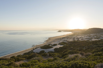 Sunset over beautiful sandy beach