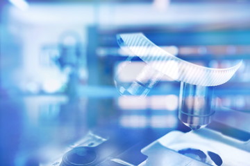 Wall Mural - microscope in blue science medical technology laboratory background