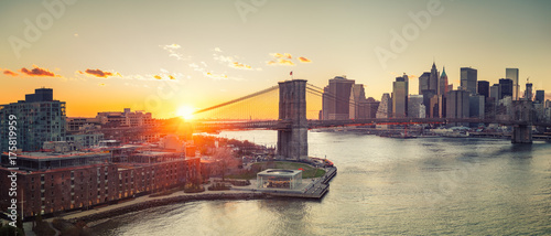 Panoramic view of Brooklyn bridge and Manhattan at sunset, New York City