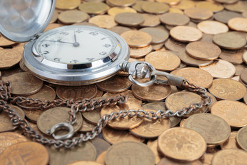 Wall Mural - Pocket watch on the coins background