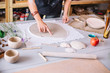© alfa27 - artist woman hands working red clay to create handcraft art