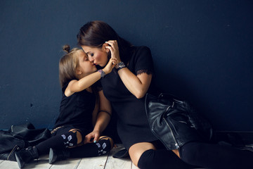 girl with long hair in black leather jacket