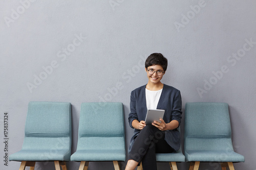 Pleasant Looking Mixed Race Woman Has Short Trendy Hairstyle