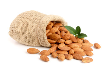 Poster - Almonds with leaf in bag from sacking isolated on white background