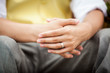 © Steve Alejandro - Close up of groom's hands during wedding.