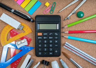 Wall Mural - Stationery of education for mathematics class in school. Mathematics equipment and mathematics tools for basic math with calculator in the center.