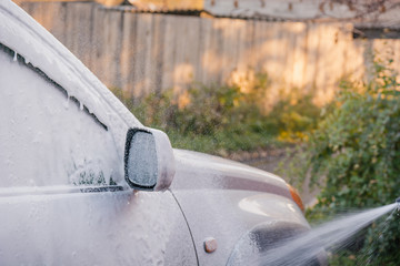 Wash the machine with foam