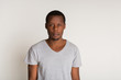 © Prostock-studio - Facial expression, emotions, concentrated black man looks straight