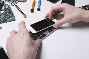 Poster - Repairman disassembling phone for inspecting