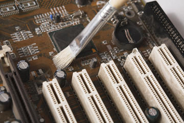Poster - Cleaning computer components close up