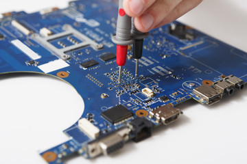Poster - Laptop motherboard testing in service center