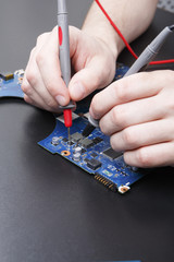 Poster - Laptop motherboard testing in service center