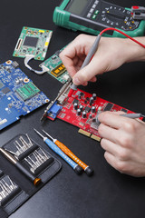 Poster - Electronic circuit red board inspecting close up