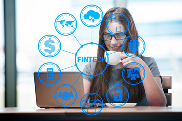 Businesswoman with computer in financial technology fintech conc