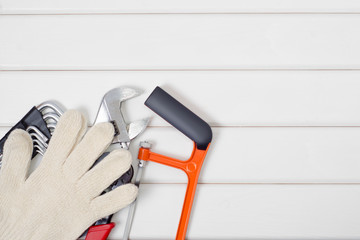 Wall Mural - Tools on a white wooden background