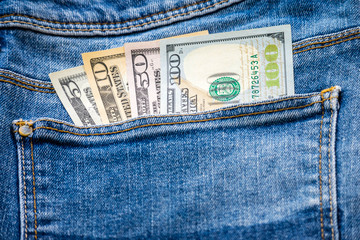 US Dollar cash in jeans pocket