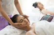 © Johnstocker - Young beautiful woman having face massage relaxing in spa.