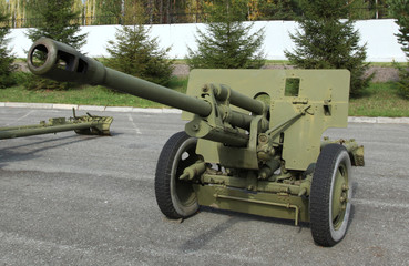 Old green artillery field cannon gun