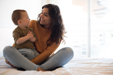 Wall Mural - mother spending time with her little baby