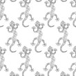 Seamless pattern with lizards on the white background.