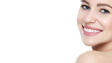 Wall Mural - beautiful young blond smiling woman with clean skin, natural make-up and perfect white teeth white b