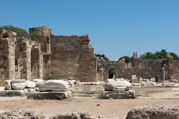 Ancient ruins in Side, Turkey. Beautiful ruins of a part of the temple of Appalon, against the blue sky.