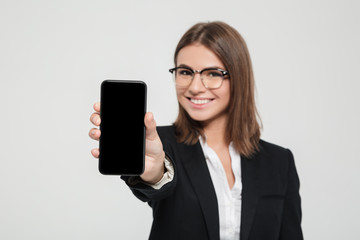 Poster - Amused happy businesswoman in eyeglasses