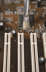 Poster - Cleaning computer components close up