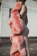 © Sonja Lekovic/Stocksy - model in underwear posing with peachy fur coat