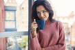 © Izabela Magier - Positive woman with a cup of coffee. Time for break