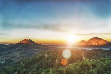 Active volcano Mount Gunung Batur at sunrise in Bali, Indonesia.