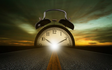 time management concept travel clock on the road